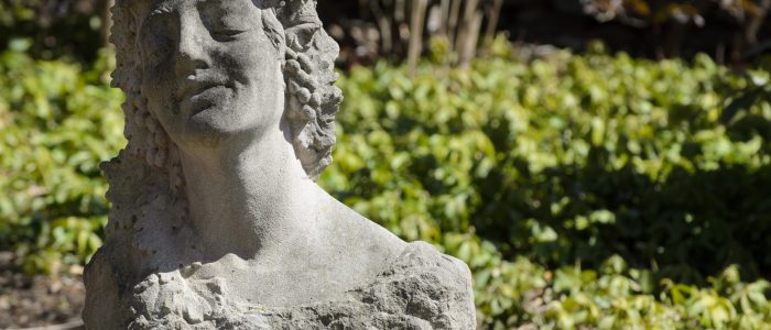 Image of statue of female head outside William Benton museum,
